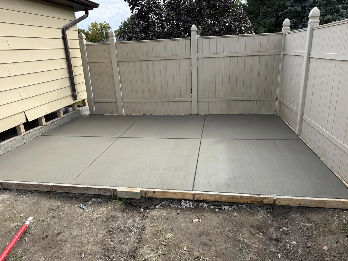 New concrete patio slab with control joints