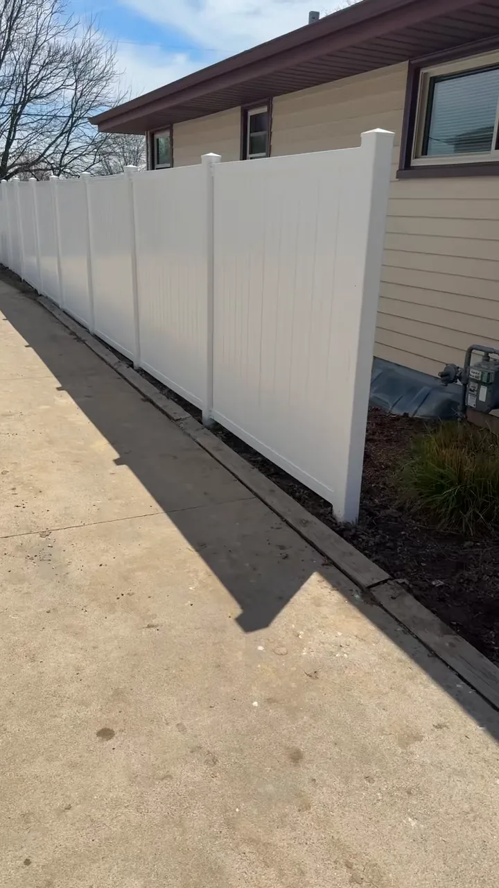 Video of a white fence installation